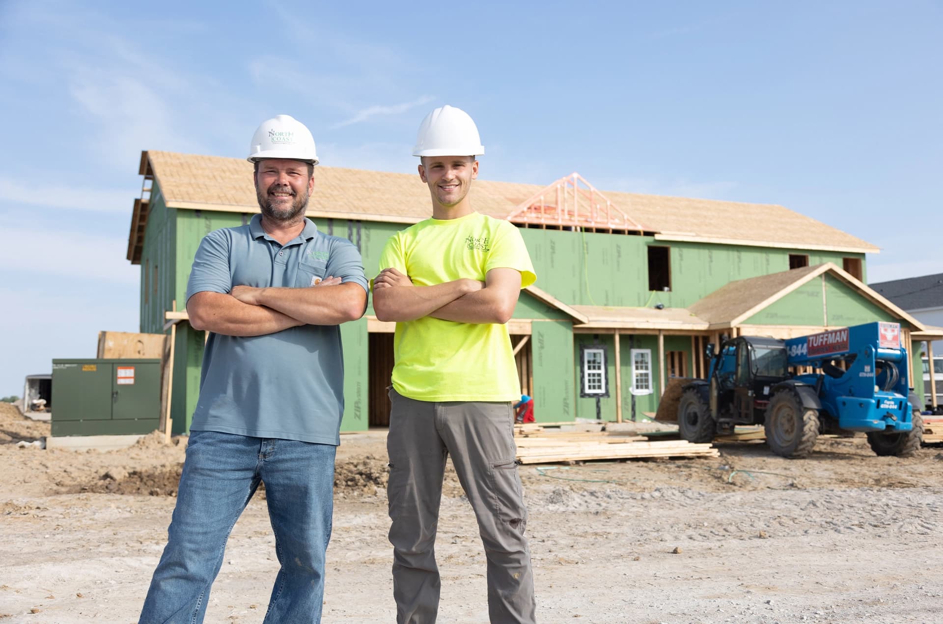 Two contractors on a commercial building site.
