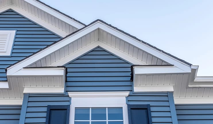 Blue exterior siding on a home.