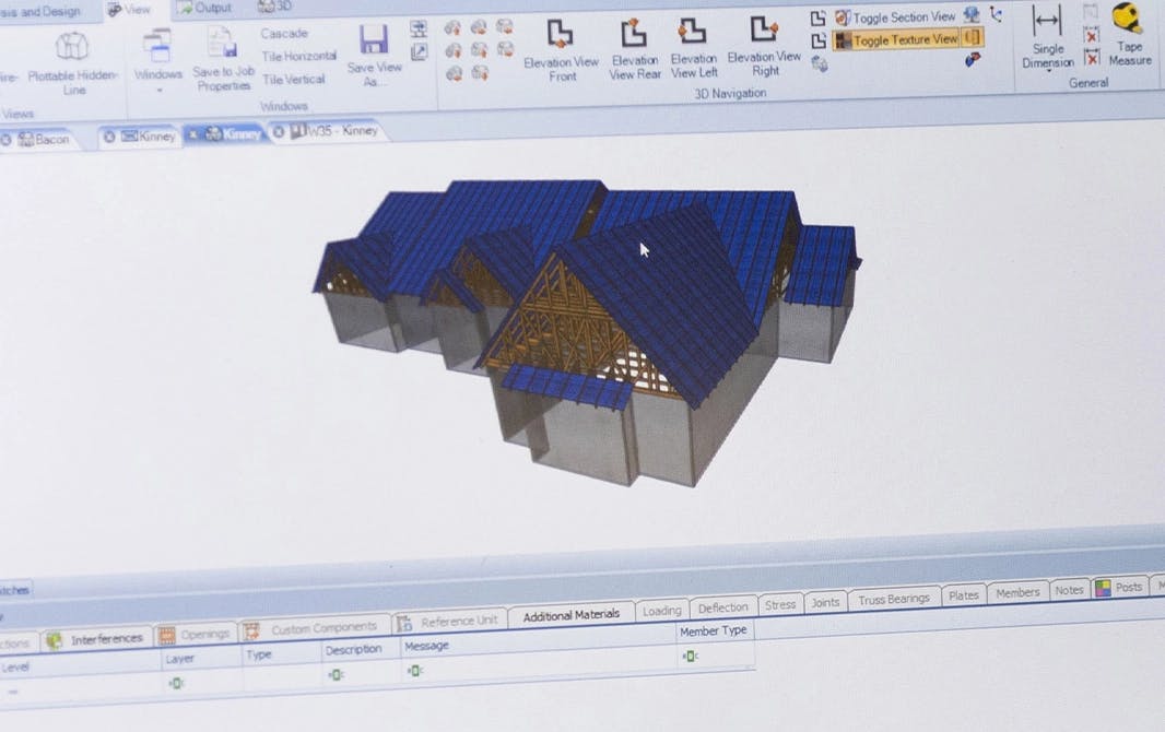 Computer screen with 3D rendering of a home building site.
